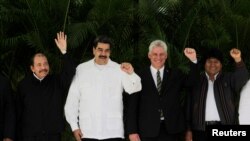 De izquierda a derecha, los presidentes Daniel Ortega (Nicaragua), Nicolás Maduro (Venezuela) y Miguel Díaz-Canel (Cuba), junto al por entonces aún presidente de Bolivia, Evo Morales, en una cumbre celebrada en la Habana, el 14 de diciembre de 2018.