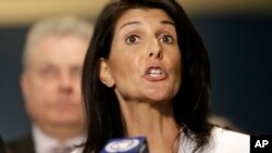 FILE - United States Ambassador to the United Nations Nikki Haley speaks to reporters outside the General Assembly at U.N. headquarters. 