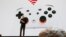 FILE - Google vice president and general manager Phil Harrison speaks during a Google keynote address announcing a new video gaming streaming service named Stadia, at the Gaming Developers Conference in San Francisco, California, U.S., March 19, 2019. 