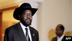 South Sudan's President Salva Kiir walks in a hotel in Addis Ababa, September 24, 2012, where he was to meet with his Sudanese counterpart Omar al-Bashir for a second day of talks. 