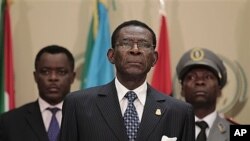 Equatorial Guinea President Teodoro Obiang Nguema, center, July 1, 2011.