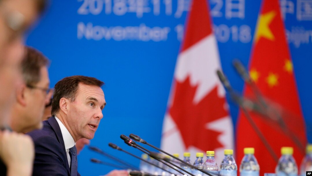 Menteri Keuangan Bill Morneau dalam pertemuan dengan delegasi China di Beijing, 12 November 2018. 