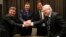 Ukraine's Fuel Minister Stavitsky, Ukraine's President Yanukovich, Netherlands' Prime Minister Rutte and Voser CEO of Royal Dutch Shell shake hands after exchanging a signed agreement at WEF in Davos, January 24, 2013. 