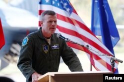 FILE - U.S. Air Forces in Europe Commander Tod D. Wolters speaks during NATO Baltic ceremony in Siauliai, Lithuania, Aug. 30, 2017.