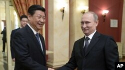 روسیه و چین برای توسعه روابط شان موافقه کردند