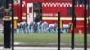 Police officers search an area of Parliament Square the morning after an attack in London, Britain, March 23, 2017. 