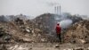 Burning Trash and Factories Belching Smoke Choke Iraqis