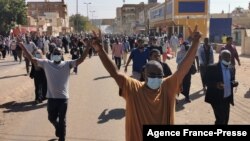 Sudanese protesters rallying against the military take to the streets of Khartoum, Jan. 6, 2022. Protests followed the resignation of civilian Prime Minister Abdalla Hamdok this week, which left the military fully in charge.
