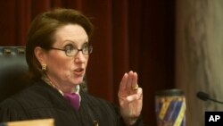 FILE - Justice Robin Jean Davis.