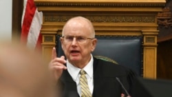 Circuit Court Judge Bruce Schroeder rebukes the prosecutor after a defense motion for a mistrial because of prosecutorial misconduct during Kyle Rittenhouse's trial at the Kenosha County Courthouse in Kenosha, Wis., Nov. 10, 2021.