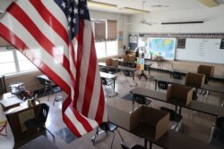 Suasana ruang kelas sekolah St. Benediktus di Montebello, dekat Los Angeles, California, AS, di tengah pandemi COVID-19, 14 Juli 2020.