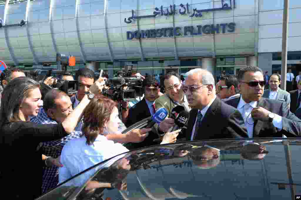 Egyptian Prime Minister Sherif Ismail talks to reporters at Cairo International Airport, May 19, 2016. He said it was too early to say whether a technical problem or a terror attack caused the plane to crash. "We cannot rule anything out," he said.