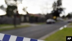 Police tape is seen at the perimeter near a house in the suburb of Glenroy in Melbourne, which was raided in 2009 in connection to planned terror attacks. Three men were convicted in December 2010 for plotting the attack.