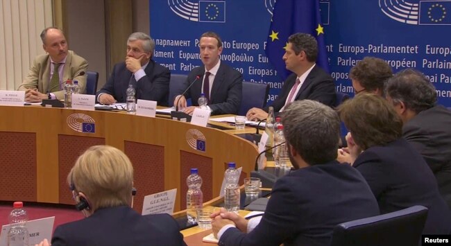 FILE - Facebook's CEO Mark Zuckerberg answers questions about the improper use of millions of users' data by a political consultancy, at the European Parliament in Brussels, Belgium, in this still image taken from Reuters TV, May 22, 2018.