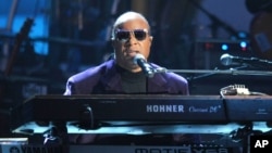 Stevie Wonder and the Rickey Minor Band perform “Master Blaster”, “My Cherie Amour” and “Sir Duke” as a tribute to Dick Clark at at the 40th Anniversary American Music Awards on Nov. 18, 2012, in Los Angeles.