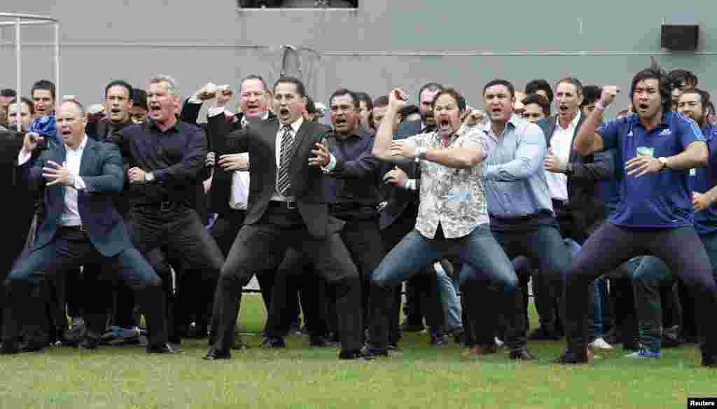 Former and present All Black&#39;s perform a Haka as former All Black Jonah Lomu&#39;s casket is carried out of Eden Park during his memorial service in Auckland, New Zealand.