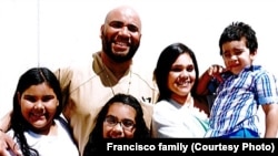 Junior Andres Francisco poses with wife Mirtha, holding their son, and two daughters in this undated photograph. They fear he may be deported from the United States to his native Dominican Republic because of a drug conviction. 