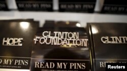 FILE - A Clinton Foundation brooch is seen for sale at the Clinton Museum Store in Little Rock, Arkansas, United States April 27, 2015.