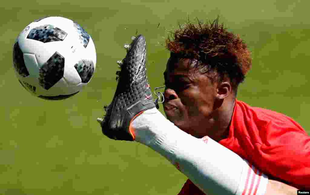 Largie Ramazani vies for a ball during the UEFA European Under-17 Championship Quarter-Final football match between Belgium and Spain at the Banks&#39;s Stadium in Walsall, Britain.