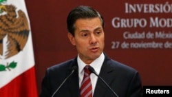 FILE - Mexican President Enrique Pena Nieto gives a speech at Los Pinos presidential residence in Mexico City, Mexico Nov. 27, 2017. 