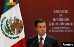 FILE - Mexican President Enrique Pena Nieto gives a speech at Los Pinos presidential residence in Mexico City, Mexico Nov. 27, 2017.