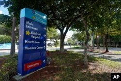 FILE - An entrance to Broward Health Medical Center is shown September 28, 2020, in Fort Lauderdale, Florida.