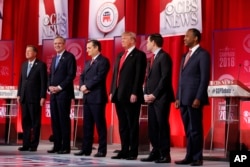 Republican presidential candidates take the stage before the CBS News Republican presidential debate at the Peace Center, Feb. 13, 2016, in Greenville, S.C.