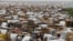 FILE - Huts and sheds are seen at the Gamboru/Ngala internally displaced persons camp in Borno, Nigeria.