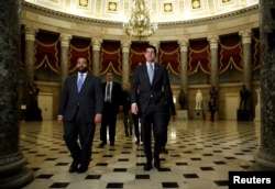 Speaker of the House Paul Ryan (R-WI) walks to the House floor before a vote to pass a budget and to end a government shutdown on Capitol Hill in Washington, U.S., Feb. 9, 2018.