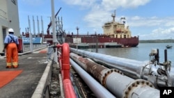 The Celsius Riga tanker carrying Kenya-produced crude oil, sits docked during a ceremony at the Kipevu oil terminal at the port in Mombasa, Kenya, Aug. 26, 2019. 