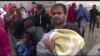 Refugees Arrive at Austrian Border; More on the Way