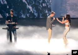 Alex Pall, left, and Andrew Taggart of The Chainsmokers, perform with Halsey at the MTV Video Music Awards at Madison Square Garden on Aug. 28, 2016, in New York.