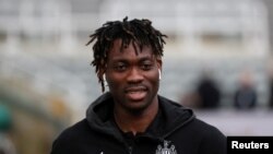 FILE - Newcastle United's Christian Atsu inside the stadium before the match against Norwich City as St James' Park, Newcastle, Britain, February 1, 2020