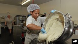 FILE - Preparation of gluten-free dough at Pure Knead bakery in Decatur, Georgia.