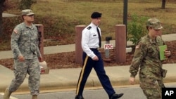 FILE - Army Sgt. Bowe Bergdahl leaves a courtroom after a pretrial hearing in Fort Bragg, N.C., Nov. 14, 2016. Bergdahl is charged with desertion and misbehavior before the enemy after walking off his post in Afghanistan in 2009.