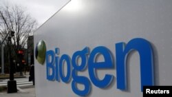 FILE - A sign marks a Biogen facility in Cambridge, Massachusetts, U.S. Jan., 26, 2017. 