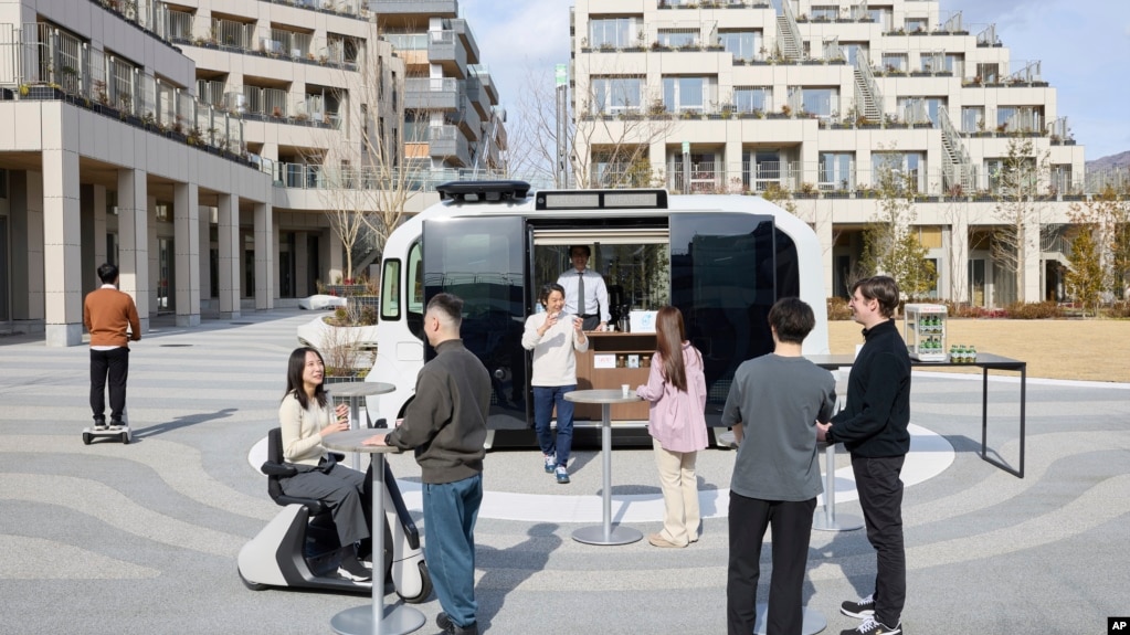 This photo provided by Woven by Toyota shows the square at the center of the apartment complexes of Woven City in Susono city, Shizuoka Prefecture on Feb. 2025. (Woven by Toyota via AP)