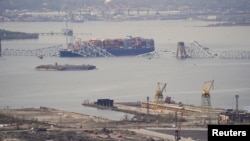 「大理號」貨輪撞毀馬里蘭州巴爾的摩市的弗朗西斯·斯科特·基大橋後的現場情景。(2024年3月26日)