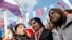 FILE - Figen Yuksekdag, center, co-chairwoman of the pro-Kurdish Peoples' Democratic Party (HDP) , participates in an attempted march that was dispersed by police in Istanbul.