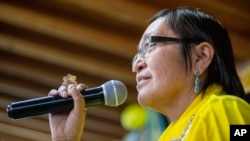 Richelle Montoya, the first woman to be elected as Navajo Nation vice president, thanks the crowd for its support after election results were posted in Window Rock, Ariz., on Tuesday, Nov. 8, 2022. (AP Photo/William C. Weaver IV)