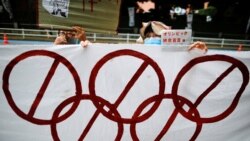 Tokioda Olimpiada o'yinlarini o'tkazishga qarshi namoyish. 23-iyul, 2020.