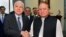 In this photo released by by Pakistan's Press Information Department, visiting U.S. Senator John McCain, left, shakes hand with Pakistani Prime Minister Nawaz Sharif prior to their meeting in Islamabad, July 3, 2017. 
