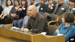 Tim Collette of Bend, Ore., tells state lawmakers about his experience working with a bank on a loan modification in Salem, Oregon, February 6, 2012.