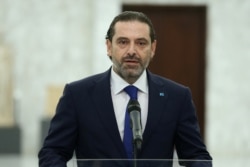 Lebanese Prime Minister-Designate Saad al-Hariri speaks as he abandons cabinet formation, after meeting with Lebanon's President Michel Aoun at the presidential palace in Baabda, Lebanon, July 15, 2021.