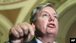 Sen. Lindsey Graham (R-S.C.) speaks to reporters on Capitol Hill in Washington, November 2011 file photo.