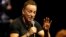 FILE - Singer Bruce Springsteen talks to journalists after a sound check session ahead of his concert in Cape Town, South Africa, Jan. 26, 2014. 
