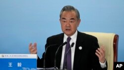 FILE - Chinese Foreign Minister Wang Yi speaks during a news conference in Beijing, Oct. 18, 2023. U.S. Secretary of State Antony Blinken will host Wang in Washington for a three-day visit starting Thursday. 
