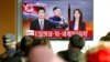 FILE - People watch a TV news report on North Korea, in Seoul, South Korea, Nov. 29, 2017.
