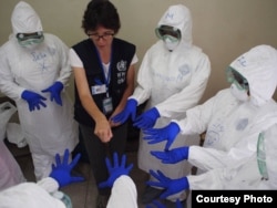In September, the World Health Organization opened a training center in Sierra Leone to teach health workers how to treat Ebola patients safely. (photo credit: WHO/N. Alexander)