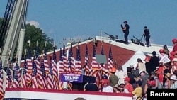 Francotiradores en el techo de un mitin de campaña del expresidente estadounidense Donald Trump en Butler, Pensilvania, EEUU, el 13 de julio de 2024, en esta imagen obtenida de las redes sociales. (Glen Van Tryfle/TMX/vía REUTERS)